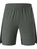 Men's forest green five-point spandex shorts with mid-waist design
