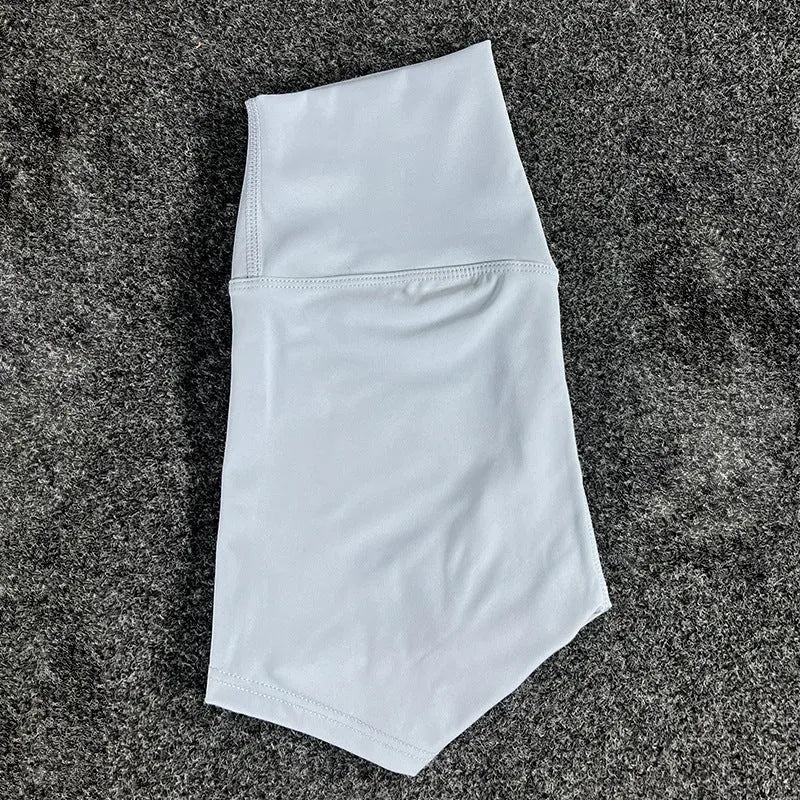 Women's high-waist yoga shorts in nylon fabric for running, sports, and cycling activities