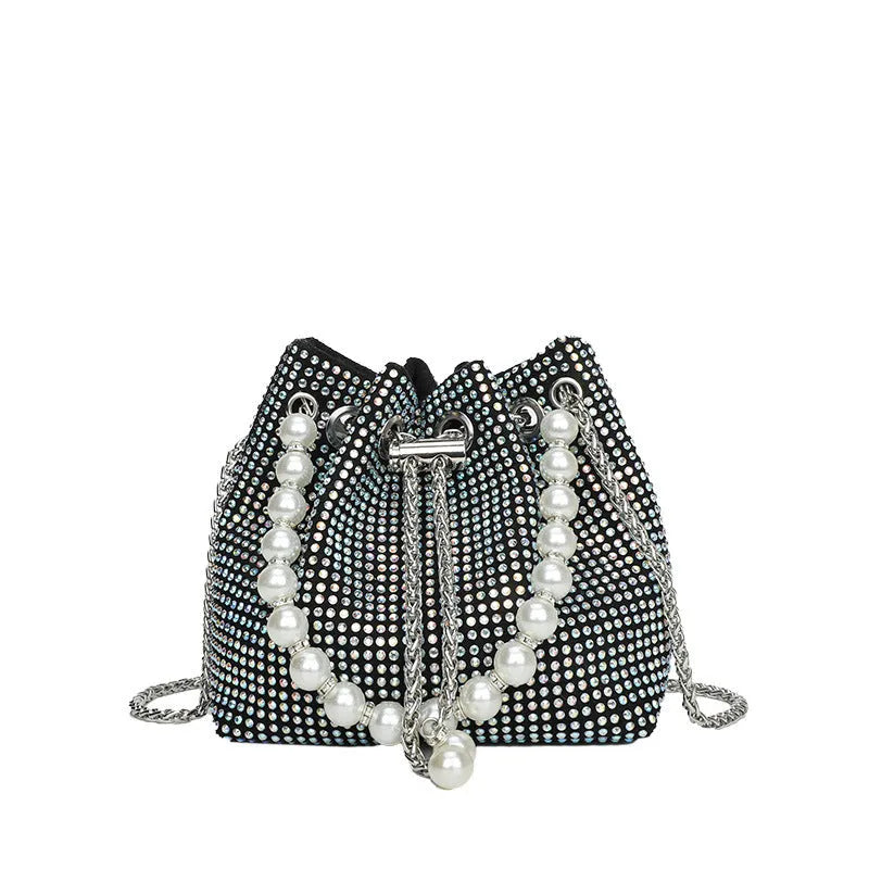 Diamond pattern crossbody bag with chain strap in bucket shape showing internal organisation compartments