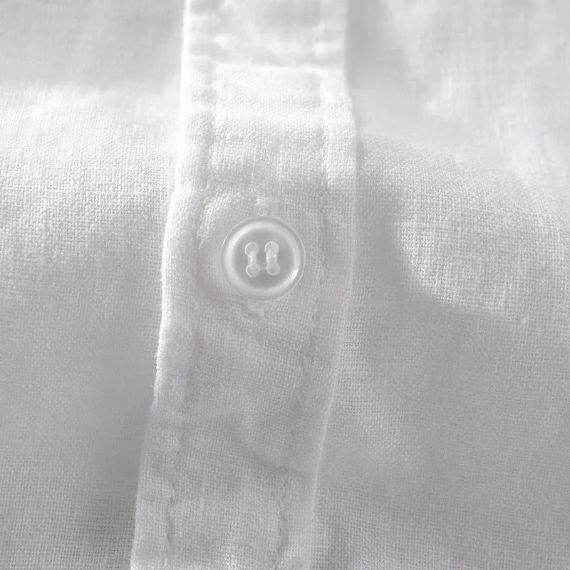 Men's loose fit short sleeve linen shirt in apricot colour on a hanger