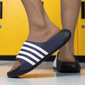 Casual EVA slippers with PVC upper in beige, black and white, blue and white, and green colour options