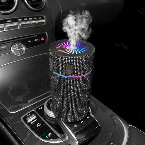 Car USB air humidifier in diamond finish colours on vehicle dashboard