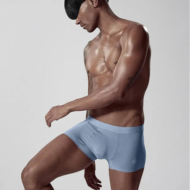 Men's seamless Modal underwear in solid colours showing mid-waist design