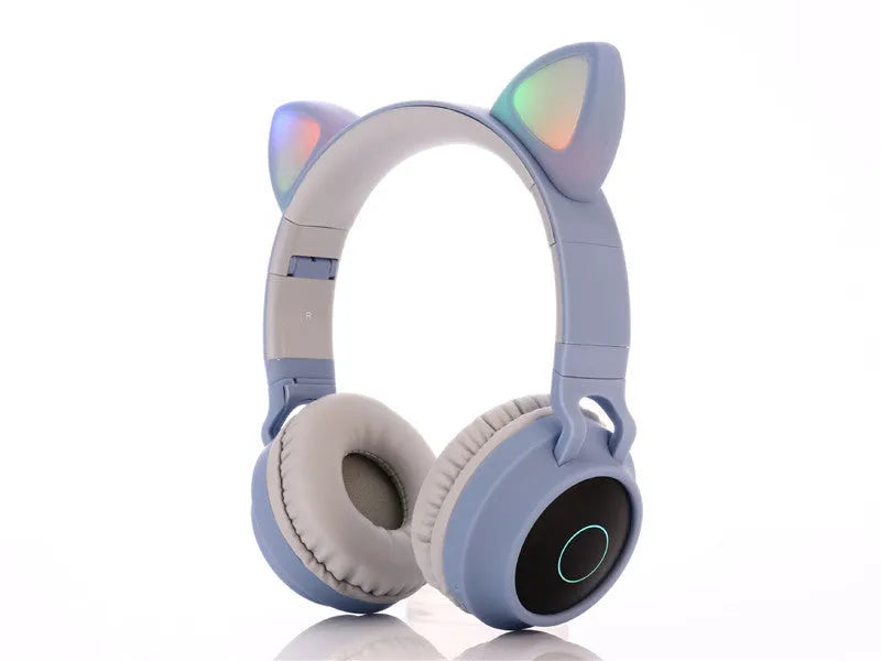 Pink cartoon cat ear wireless Bluetooth headset with headband, shown on a white background.