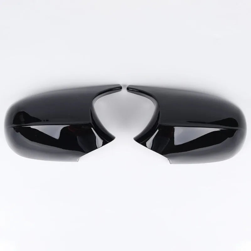 Pair of black ABS plastic rearview mirror housings for BMW 3 Series E90 model.
