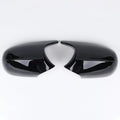 Pair of black ABS plastic rearview mirror housings for BMW 3 Series E90 model.