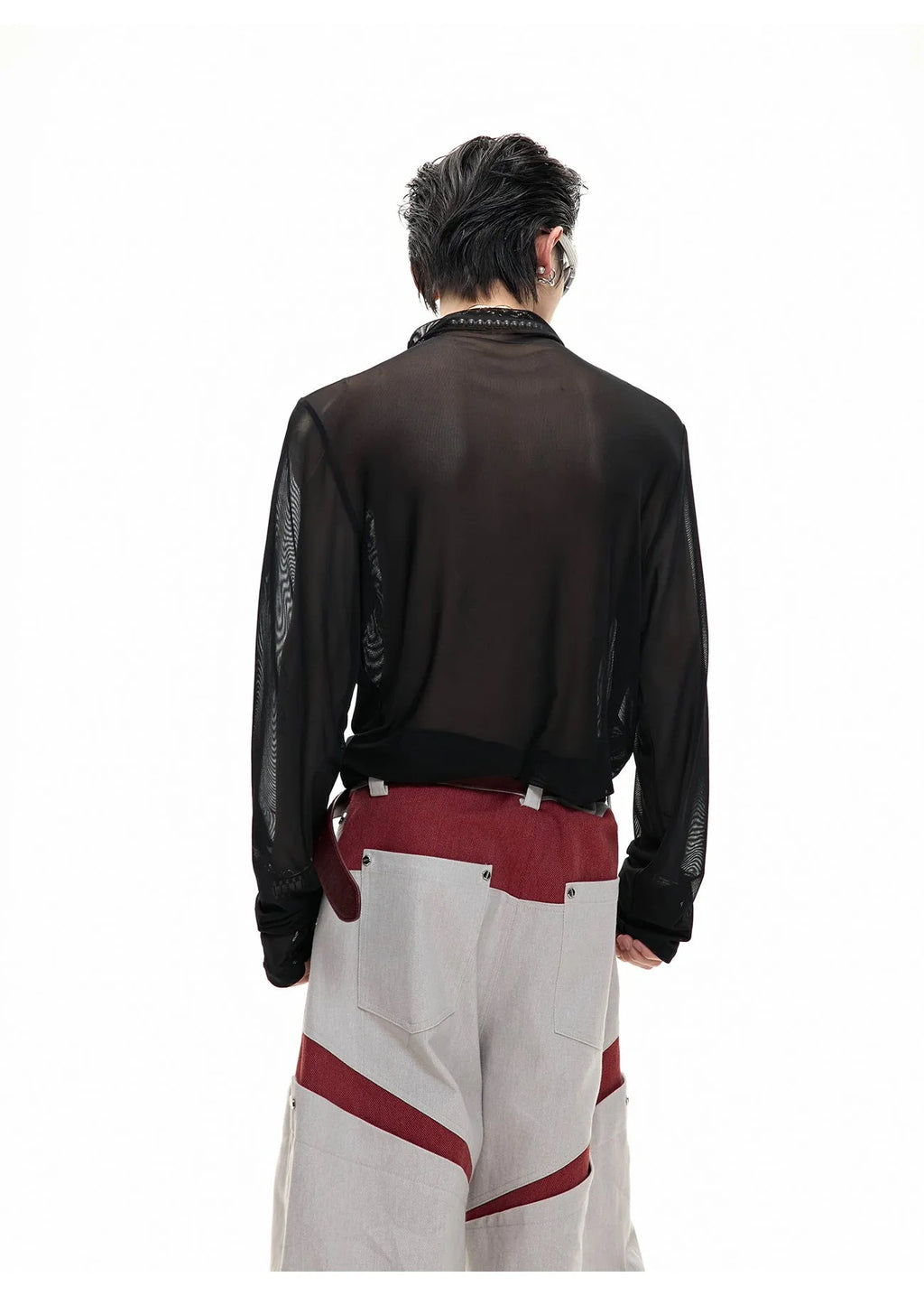 Men's black slim-fit mesh long-sleeve bottoming shirt laid flat, showing texture.