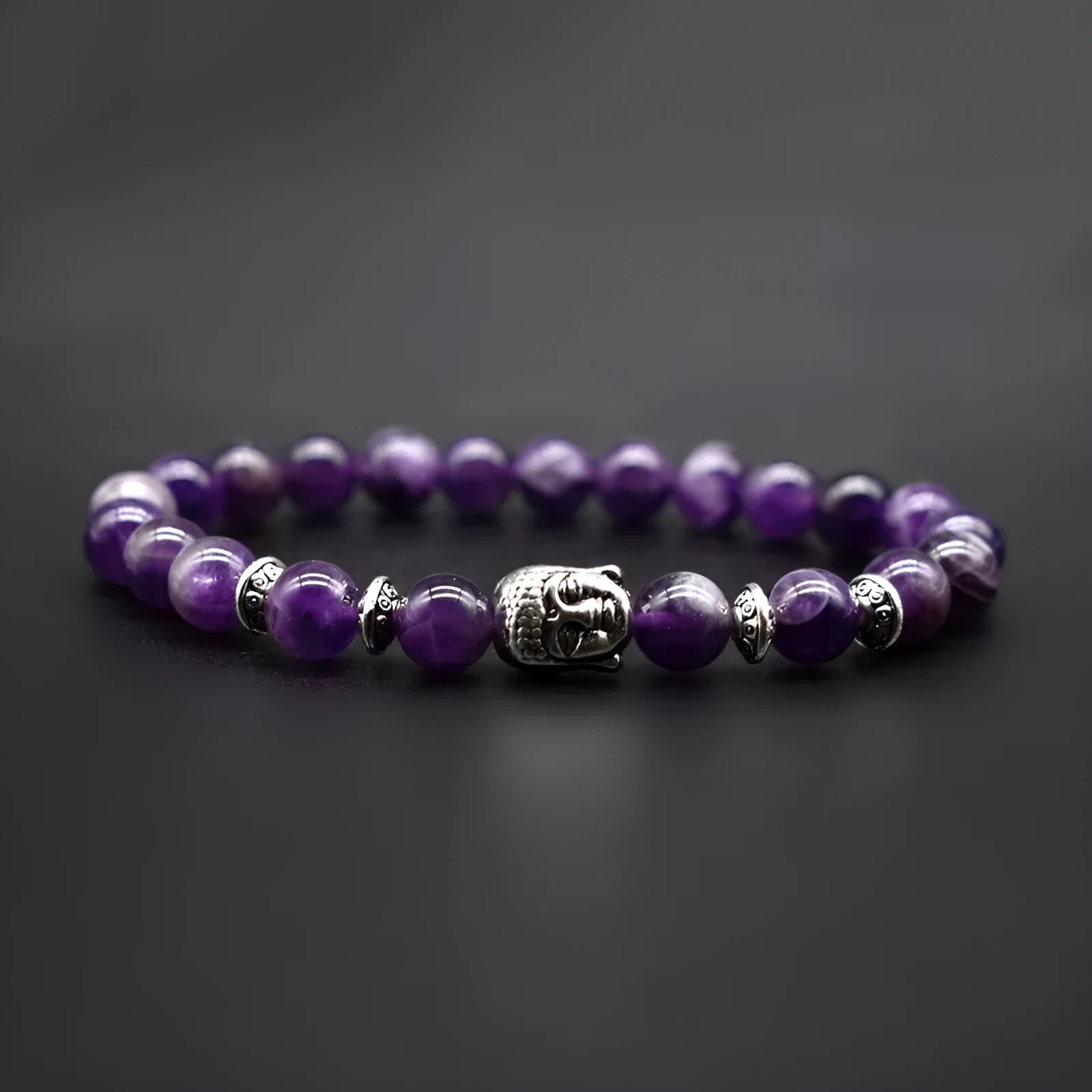 Handcrafted amethyst Buddha head bracelet with tiger eye beads measuring 19mm