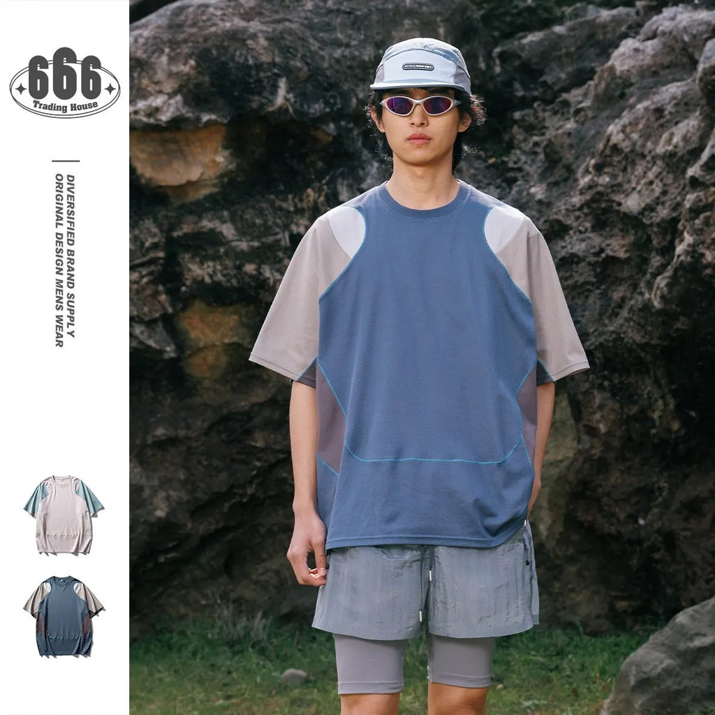 Men's loose fit cotton blend t-shirt in Galaxy Blue with short raglan sleeves and a printed design.