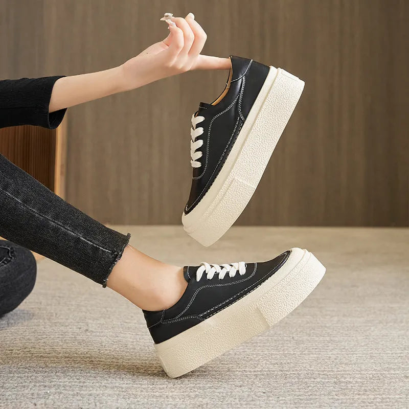 Women's black and white platform casual shoes with embossed cowhide leather and round toe design
