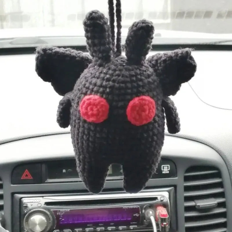Plush hand-woven car hanging ornament in a cartoon design made from polyester