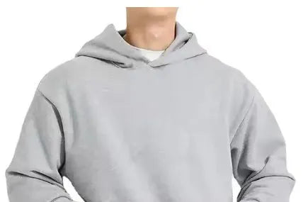 A man's grey fleece-lined cotton pullover hoodie on a hanger.