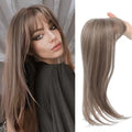 Synthetic hair clip-in wig with inner buckle fastening, shown in one of six available style colour options.