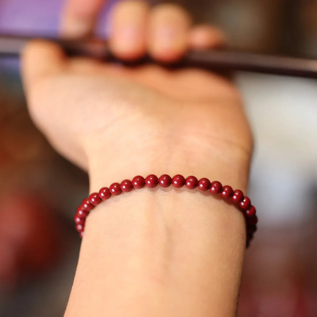 Handmade natural cinnabar bracelet with purple gold sand geometric design, traditional Chinese style jewellery
