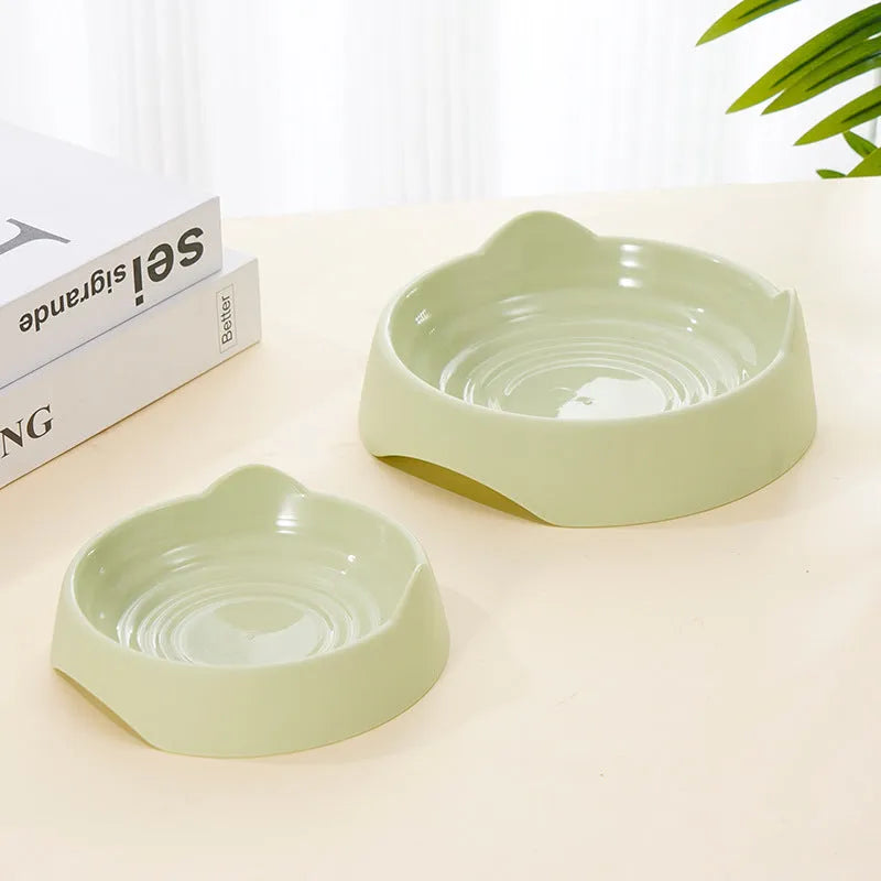 Blue ceramic dog slow feeder bowl with raised maze pattern inside for slowing down fast eaters.