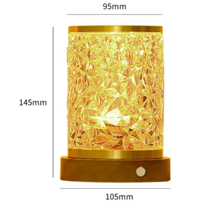 Modern rotating water ripple night light with acrylic body and solid wood base on a surface.