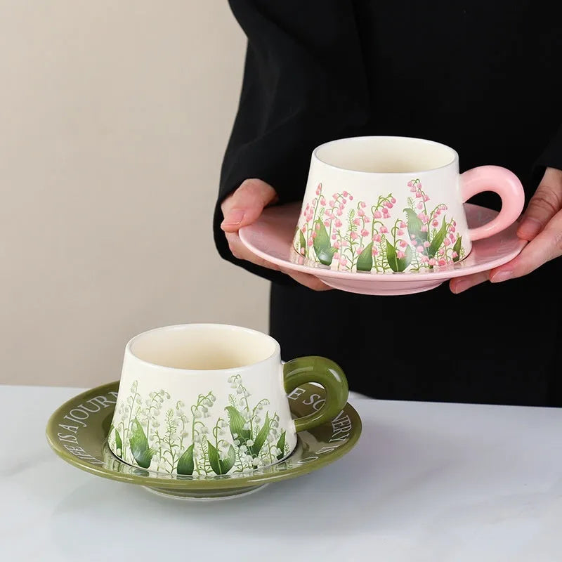 Ceramic coffee cup and saucer set with 300ml capacity cups and matching stirring spoons