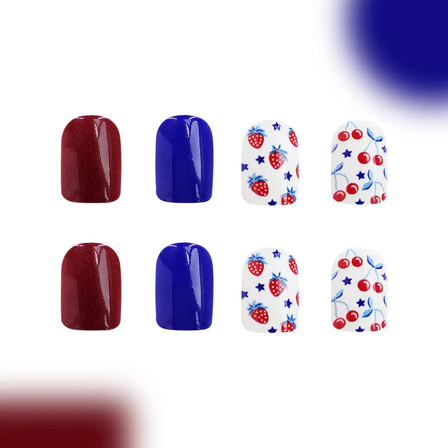 Short glossy red and blue nail stickers with strawberry and cherry pattern, 24 pieces.
