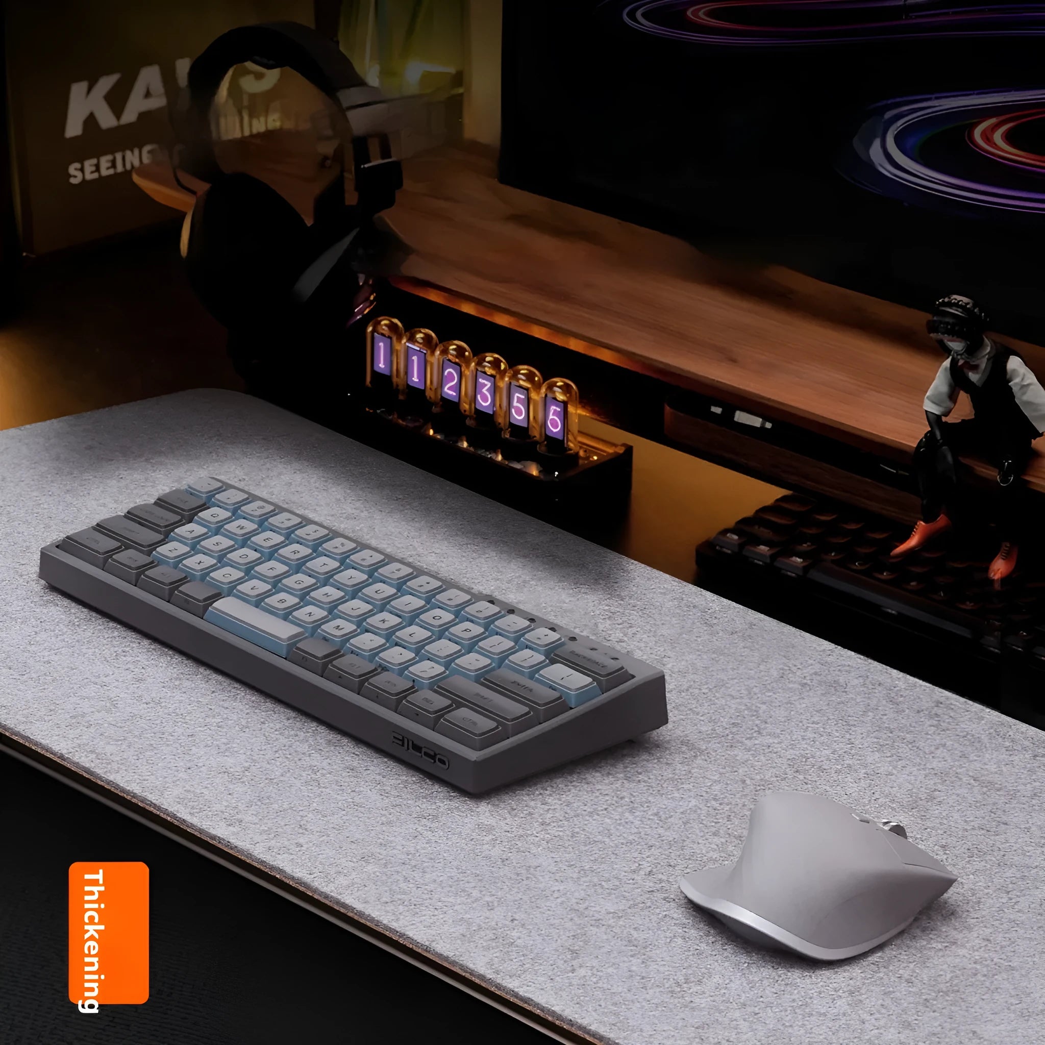 Oversized felt and cork office mouse mat showing black grey colour option on desk