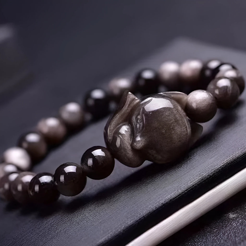 Obsidian fox adjustable bracelet with 8mm polished stone bead and silver fox charm on sliding knot