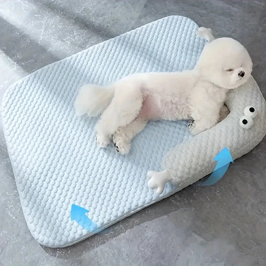 Blue pet cooling bed with large-eye monster design on non-slip polyester mat for dogs and cats