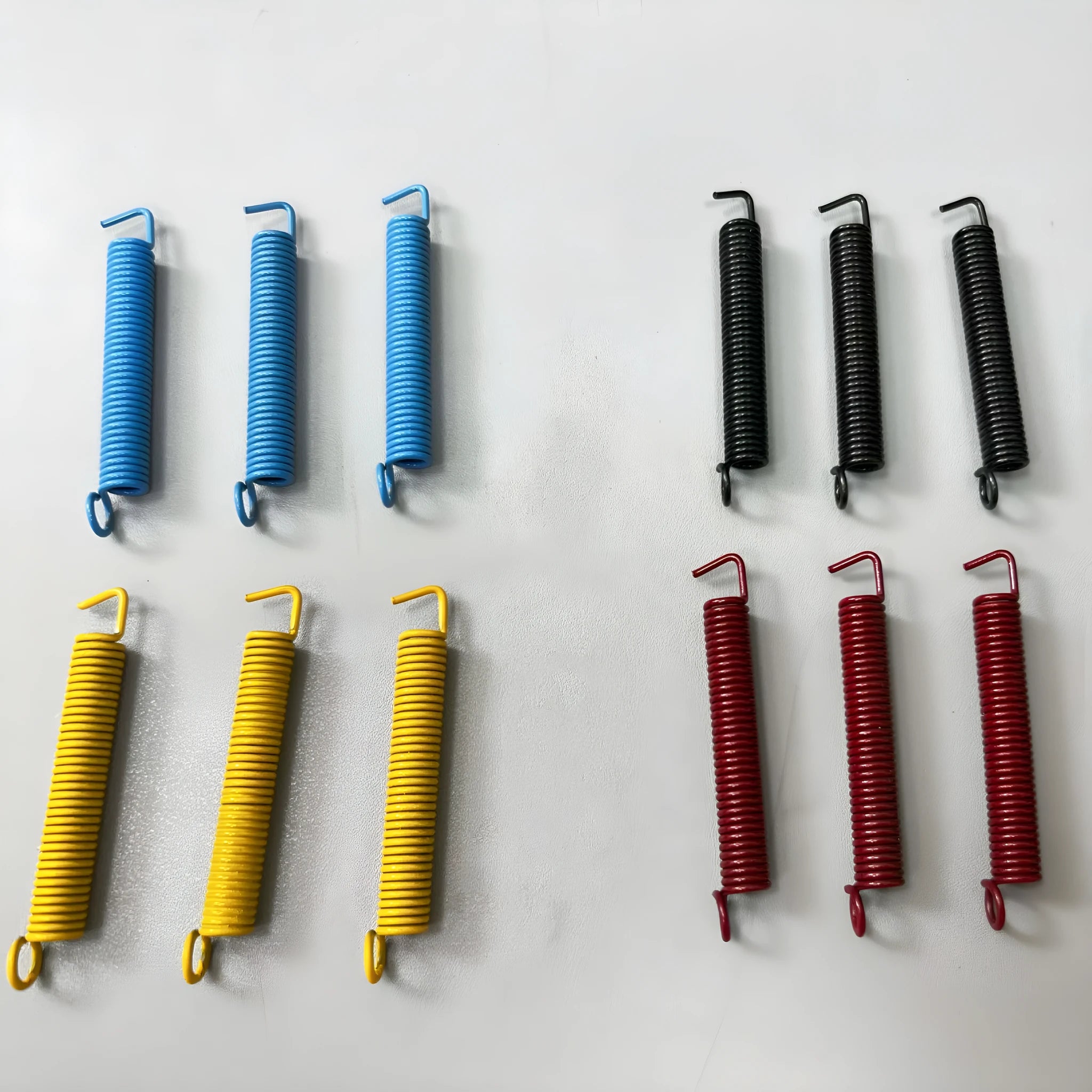 Electric guitar tremolo bridge springs in black red blue yellow and colourful for Stratocaster style guitars