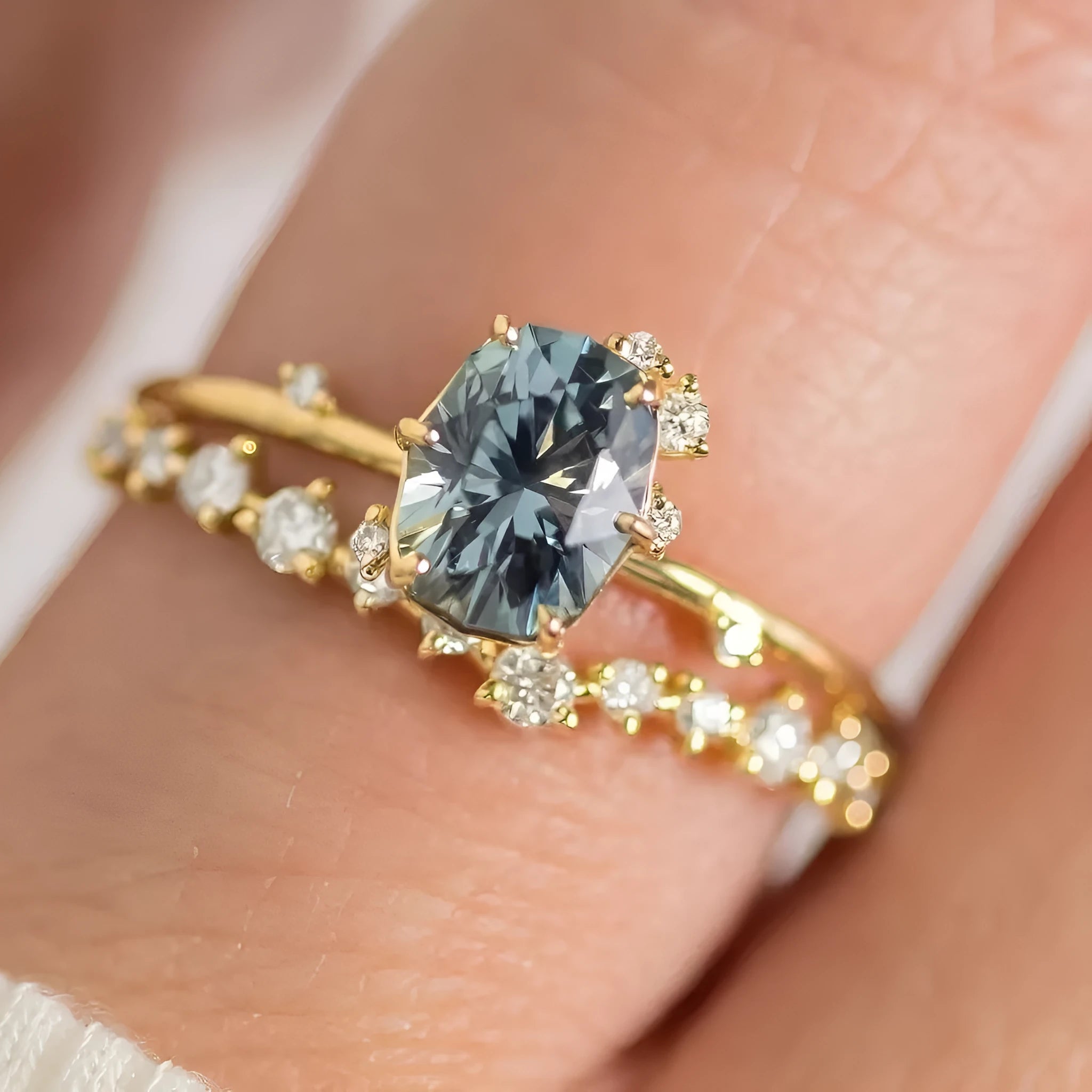 Gold electroplated women's ring with flower design featuring green zircon stones