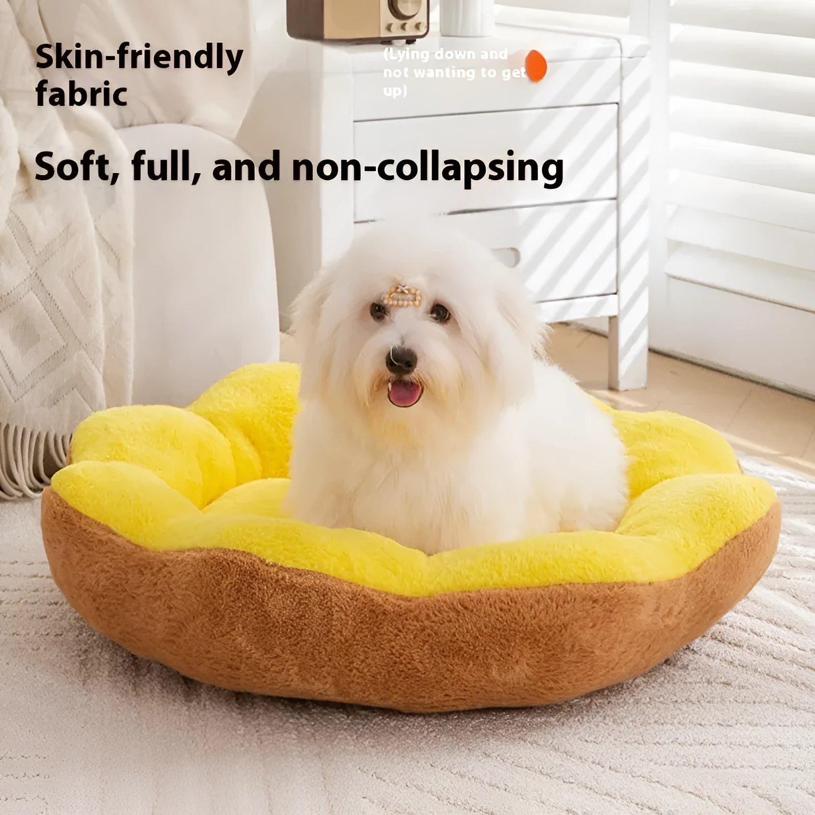 Round plush cat bed with removable cover in brown gray colour, shown in a home setting.