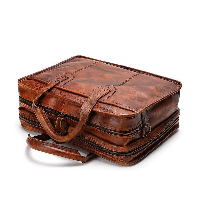 Men's vintage leather briefcase in horizontal square design with multiple internal compartments