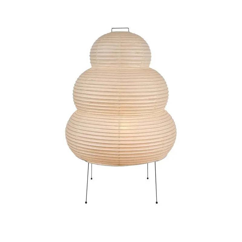 Handmade Nordic-style table lamp with a Japanese rice paper shade and aluminium base on a wooden table