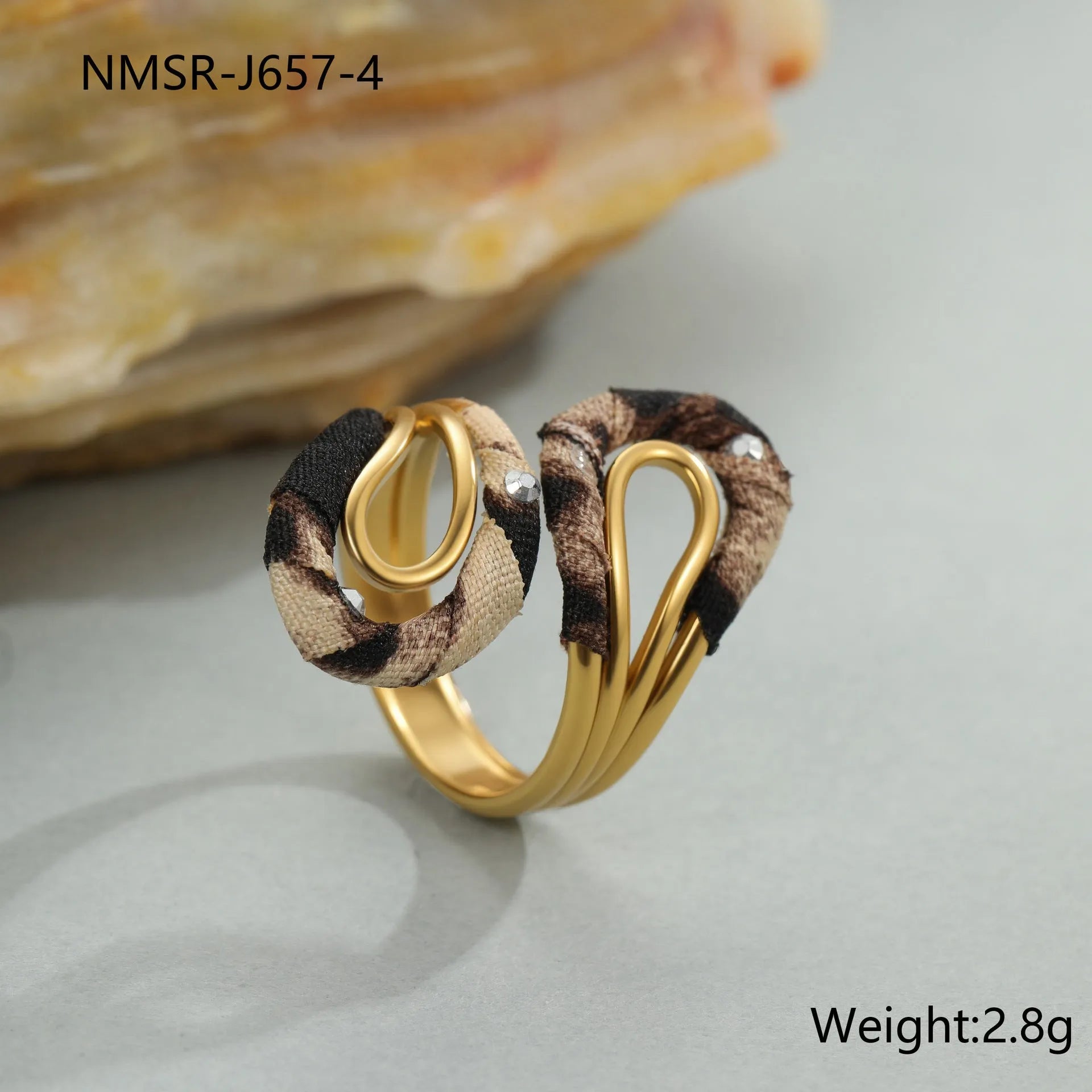 Stainless steel open mouth ring with leopard print and geometric designs including heart and star shapes