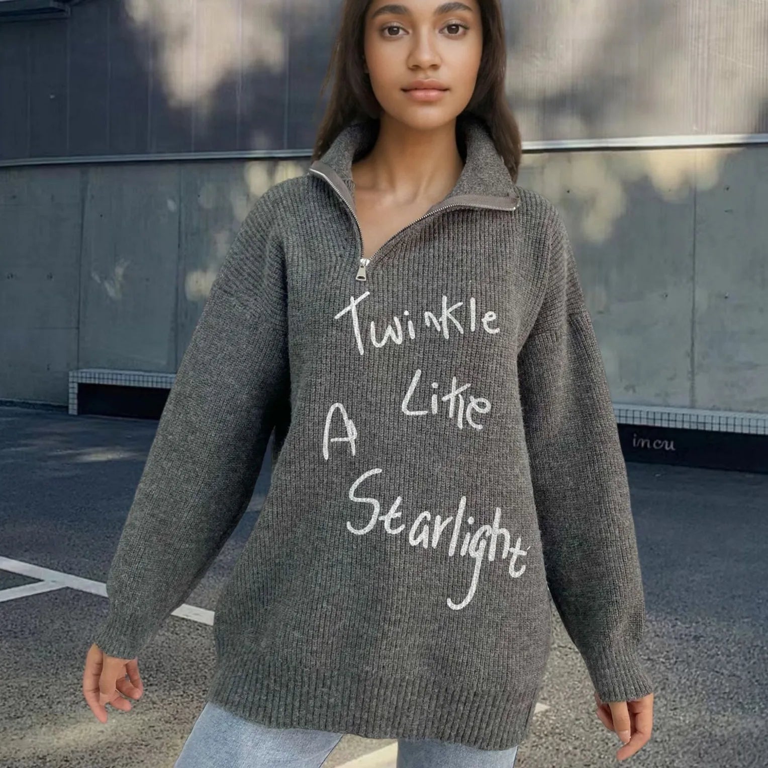 Women's light khaki alpaca wool retro sweater with loose lapels and an oblique zipper.