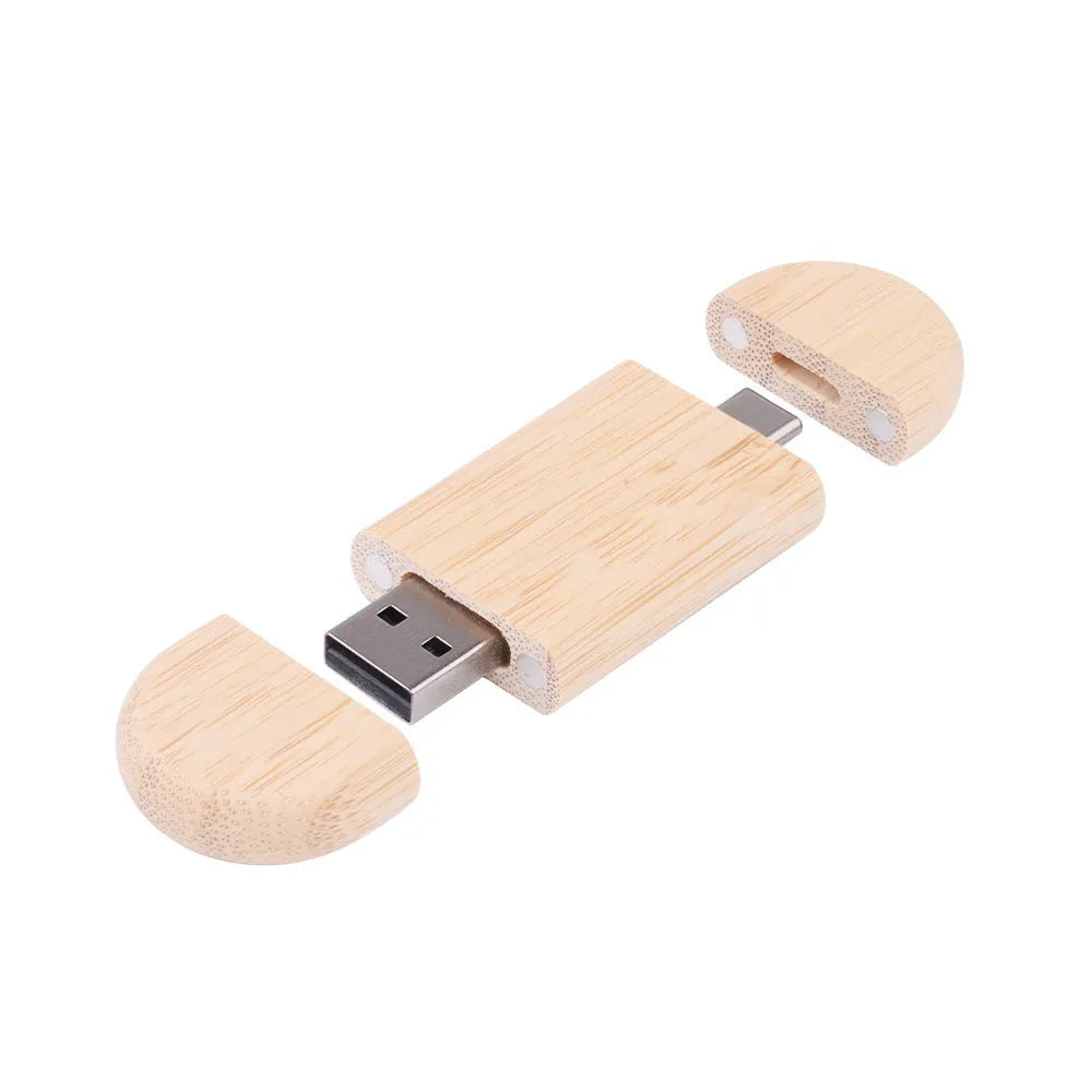 Custom engraved maple wood USB flash drive with Type-C connector for mobile phones on a wooden box.