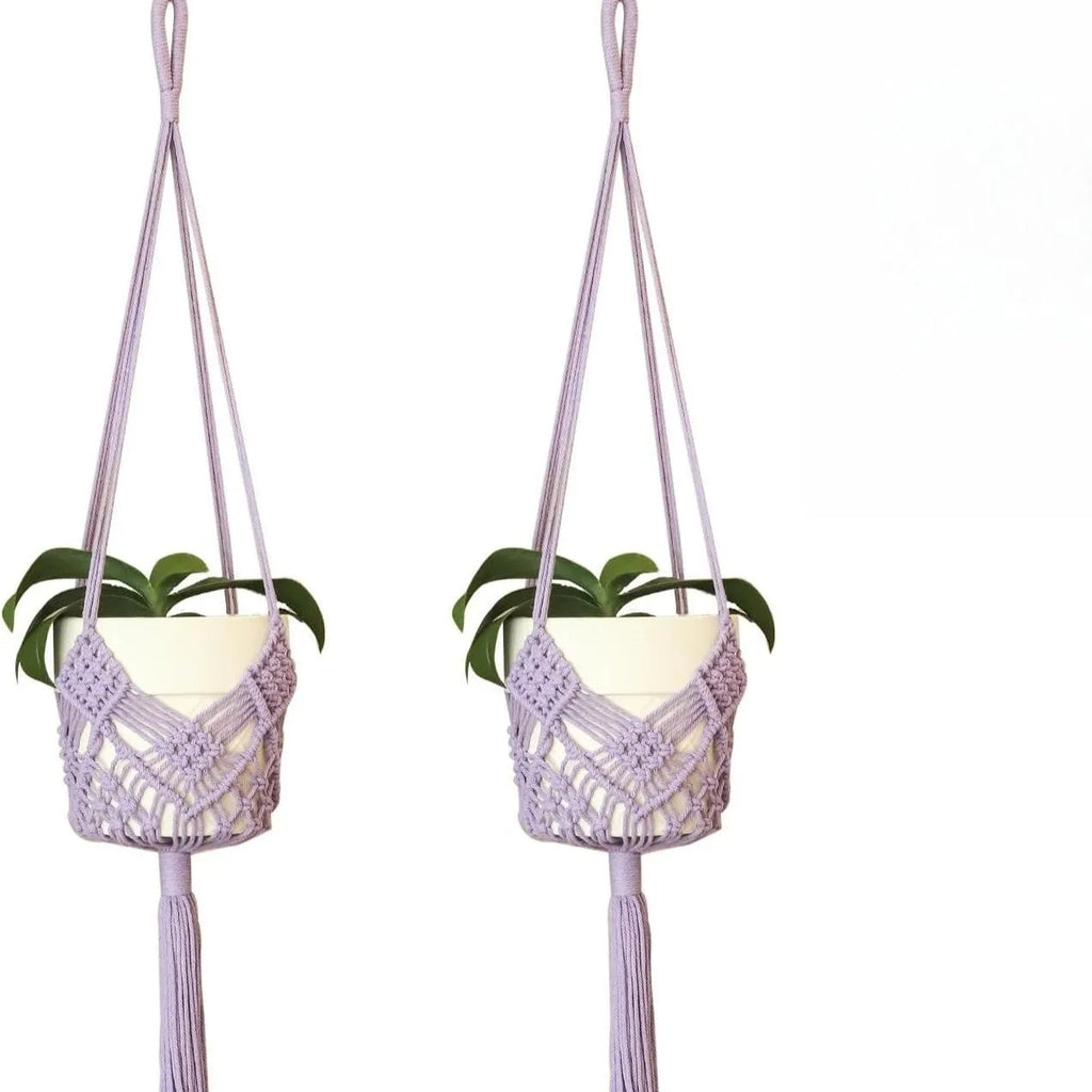 Handwoven brown polyester cotton flower pot net sleeve covering a plant pot.