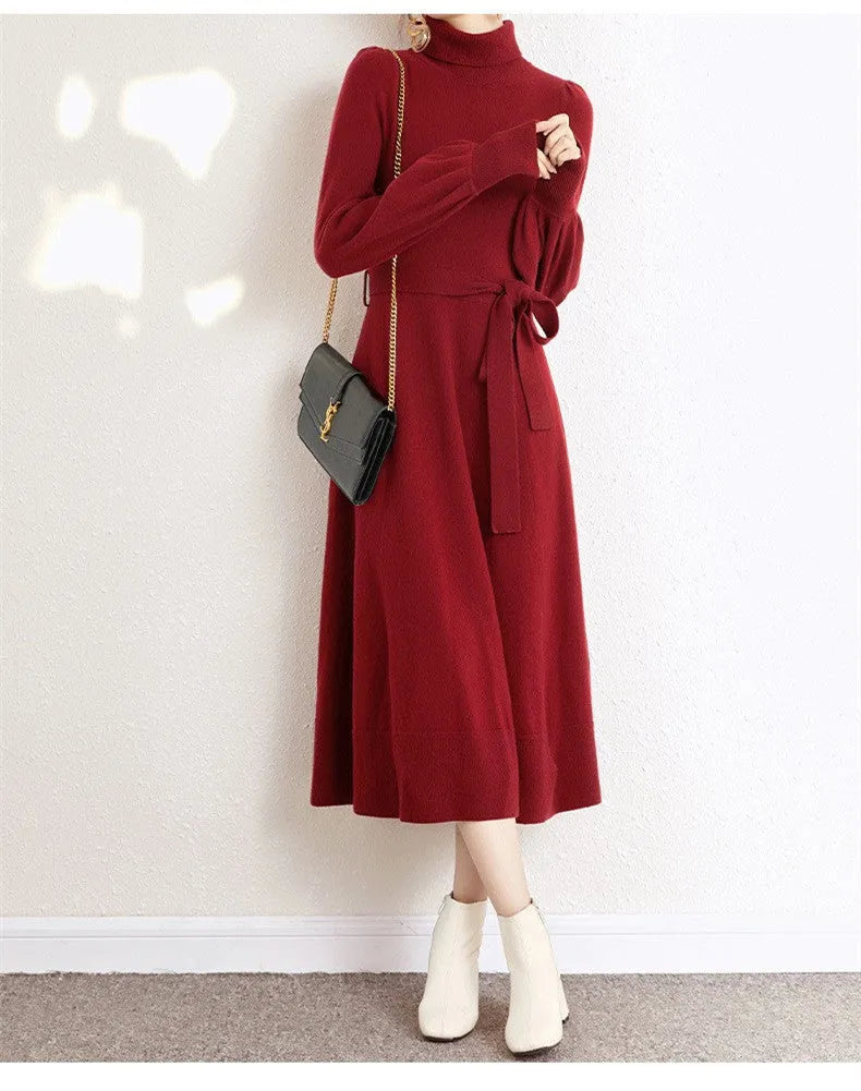 Women's rose red turtleneck long sleeve knit dress with elastic waist and loose mid-length skirt.