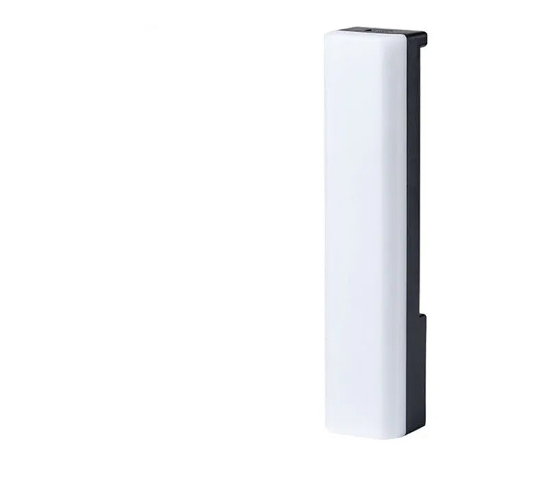 Black and white 3D RGB voice-activated music rhythm ambiance lamp on a tabletop.