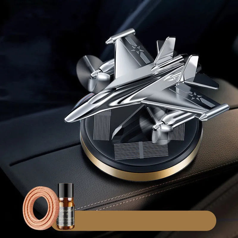 Solar powered rotating fighter aircraft perfume ornament in metallic finish with essential oil diffuser
