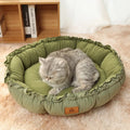 Grey reversible donut cat bed with raised rim suitable for indoor cats and small dogs