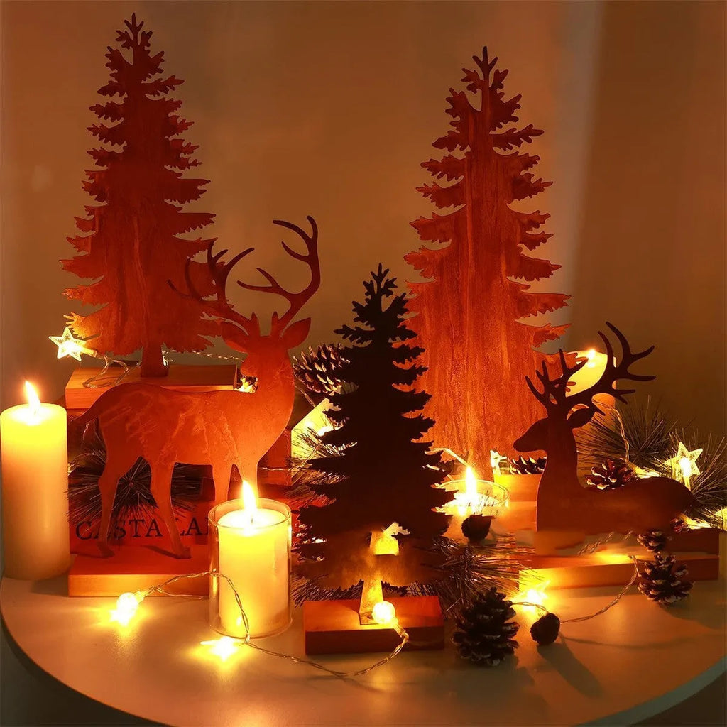 Set of three rusty metal Christmas tree ornaments with elk designs on a rustic background.