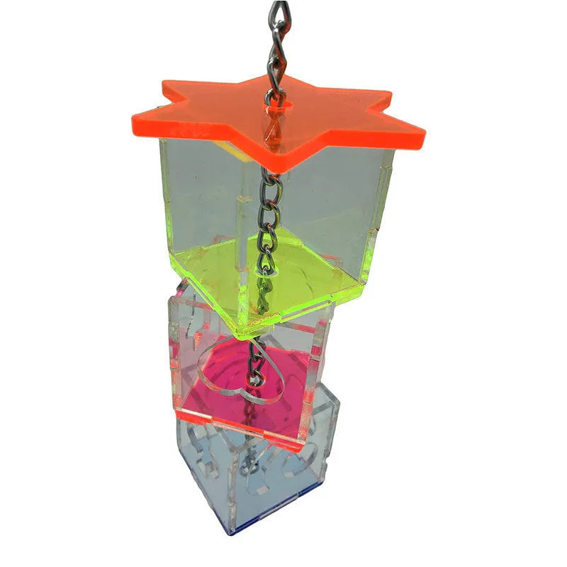 Transparent acrylic parrot foraging toy measuring 32cm long for bird enrichment with fruits and nuts