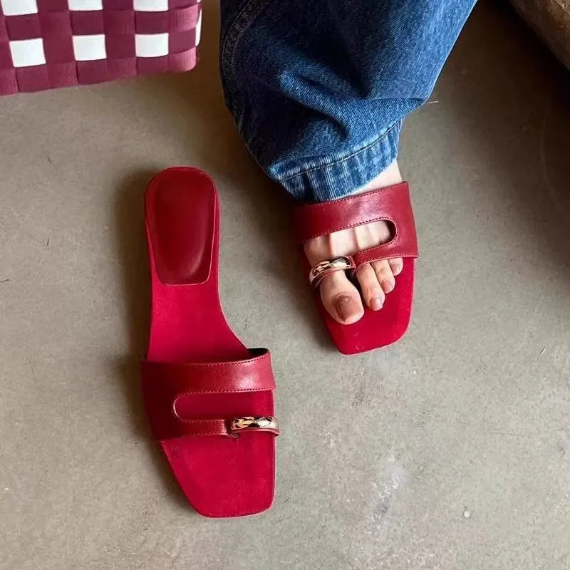 Women's plus size square toe outdoor slippers in leather with a rubber sole.