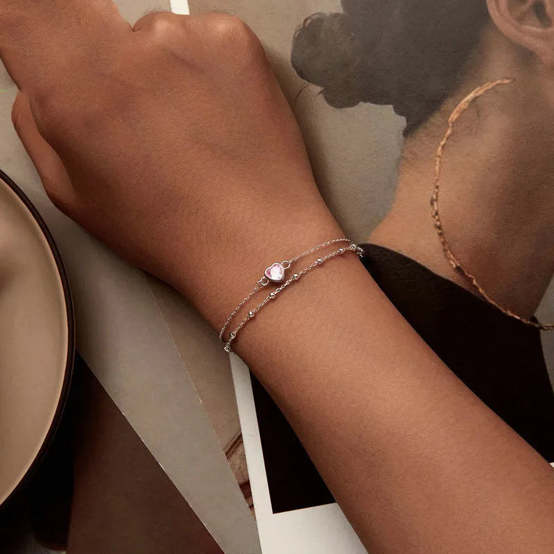 925 sterling silver bracelet with small heart pendant on an adjustable chain, style BSB152.