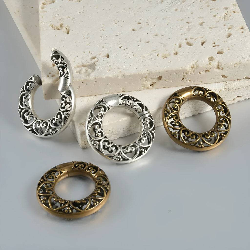 Retro heart-shaped hollow lotus magnetic earrings in stainless steel with antique silver finish