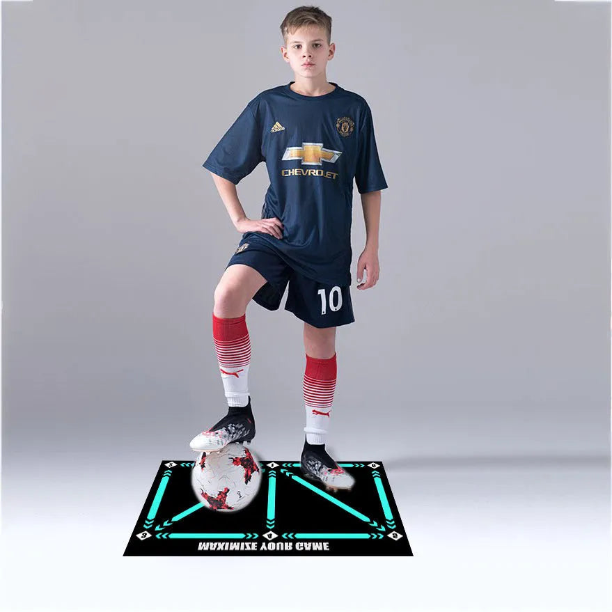 Black football training mat measuring 60 by 90 centimetres with non-slip surface