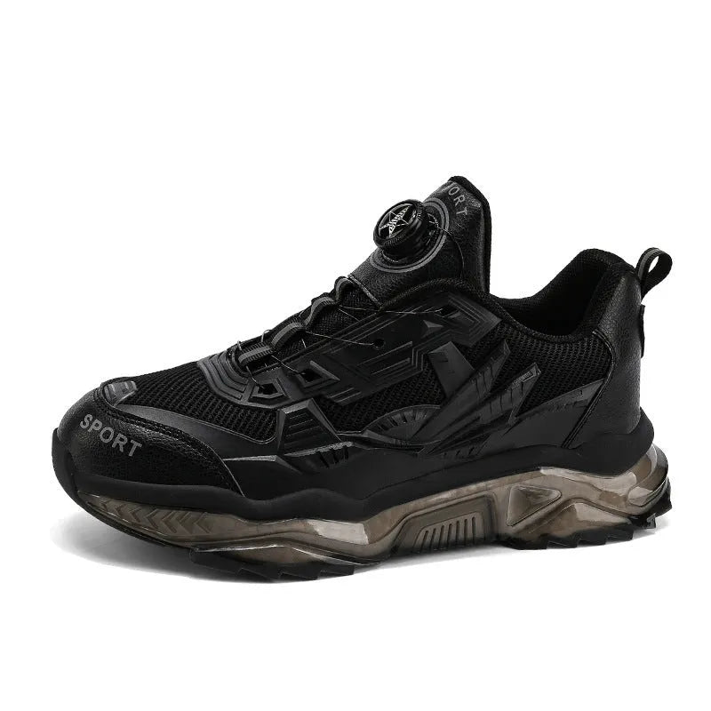Men's black casual shoes with a rotating button closure and mesh upper on a rubber sole.
