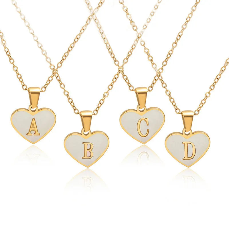 Gold plated personalised heart necklace with white shell on a 45cm chain