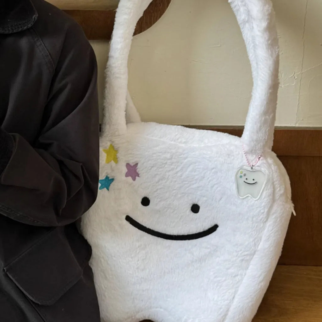 White plush shoulder tote bag with cute teeth pattern and zipper closure
