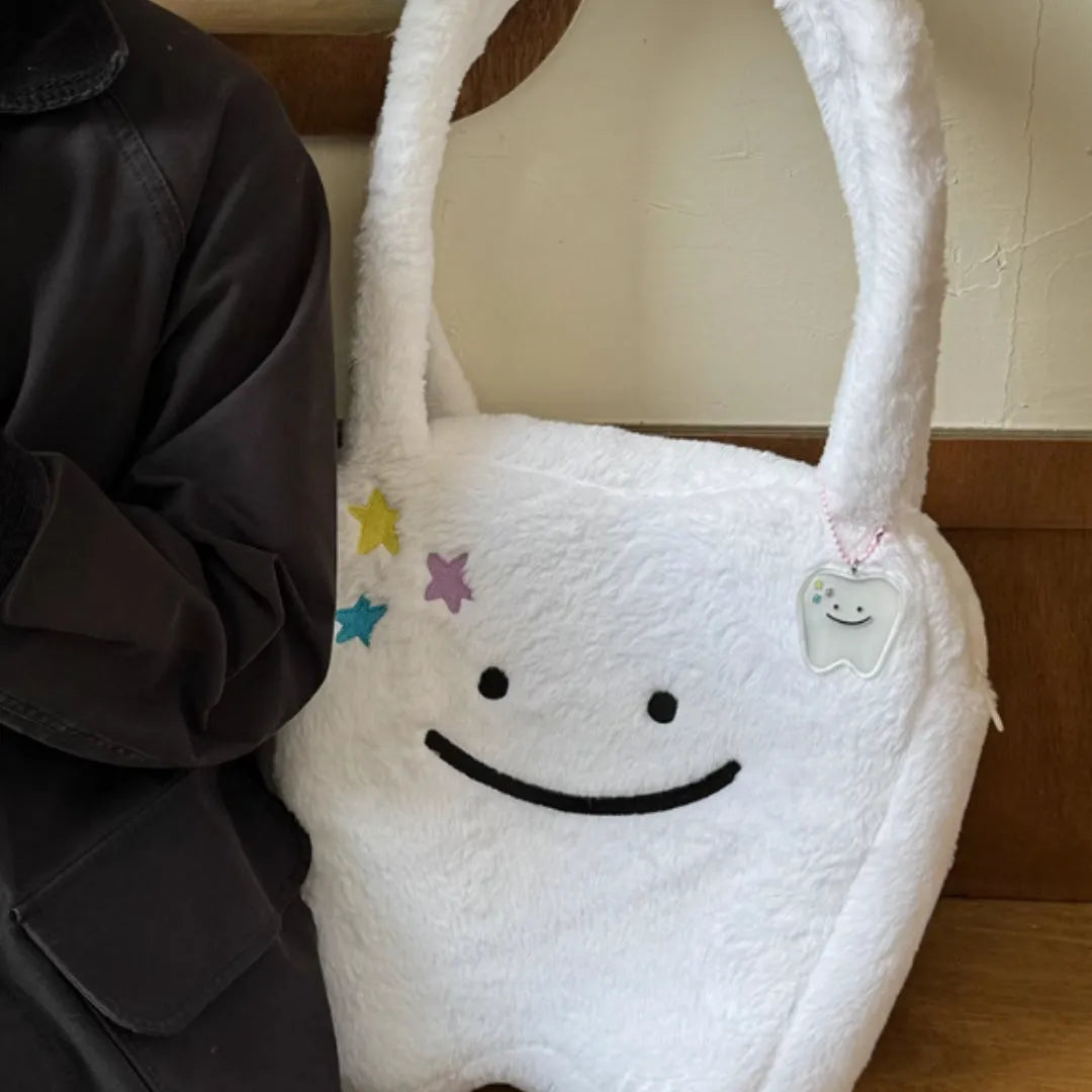 White plush shoulder tote bag with cute teeth pattern and zipper closure