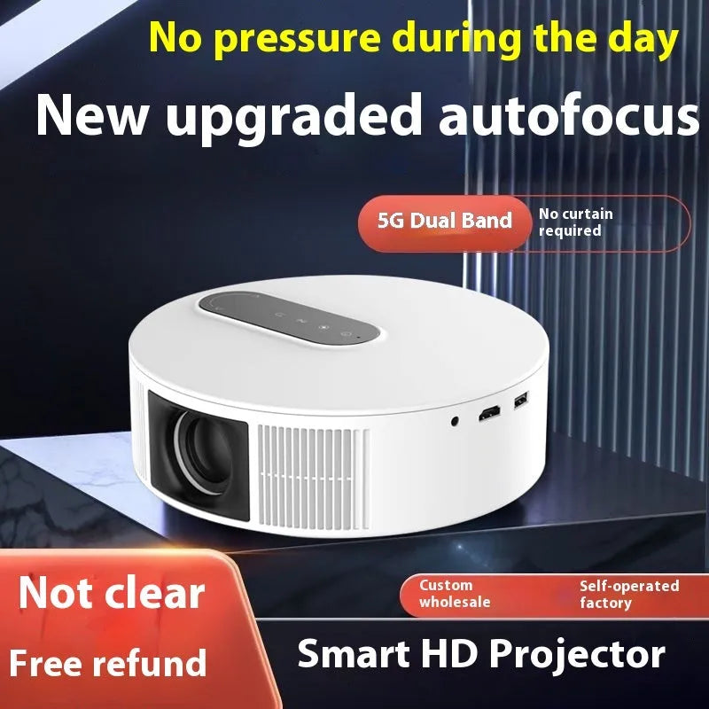 White 720p HD home theatre projector with remote control on a table