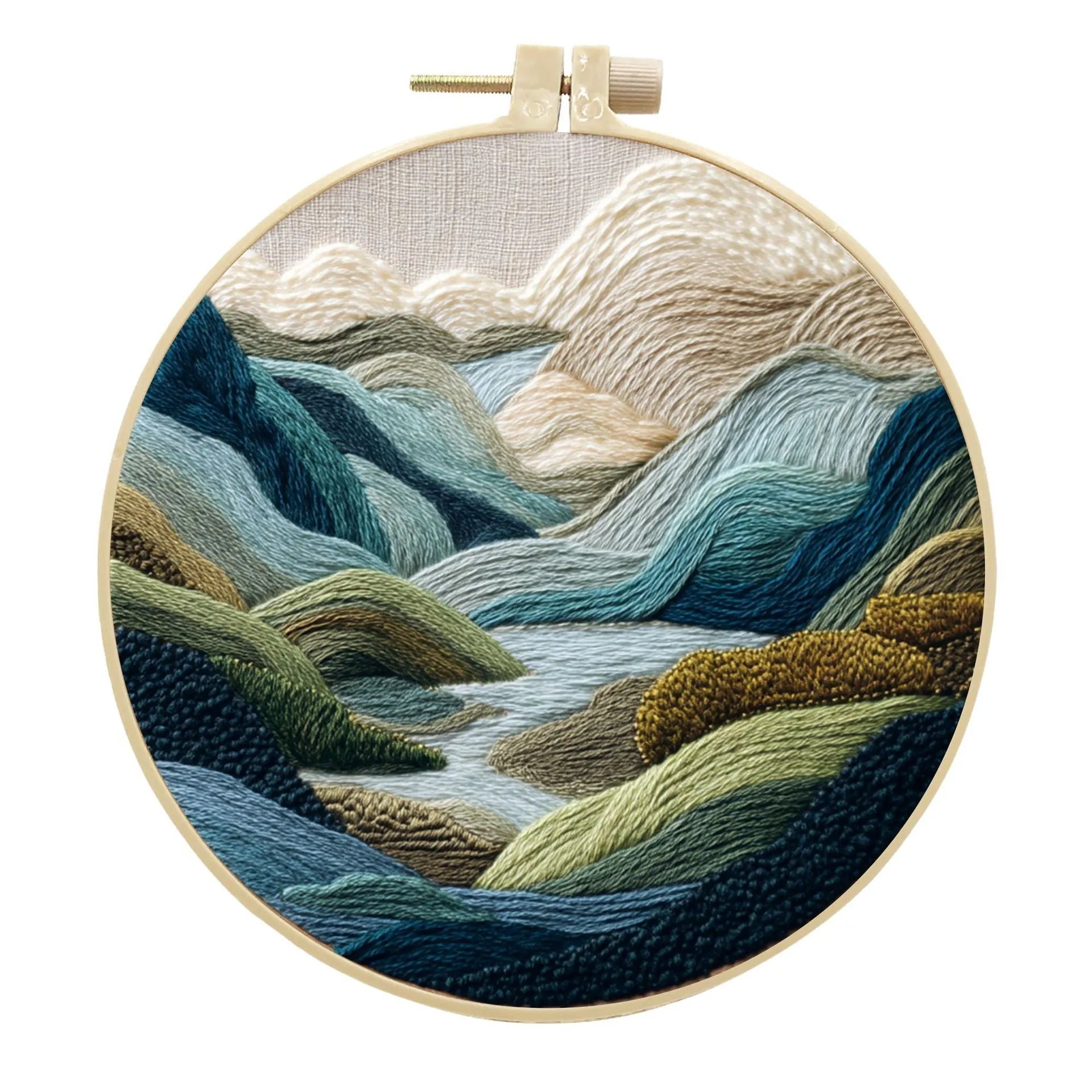 Embroidery DIY kit with printed landscape fabric, embroidery threads, needles, and frame for handmade cloth art